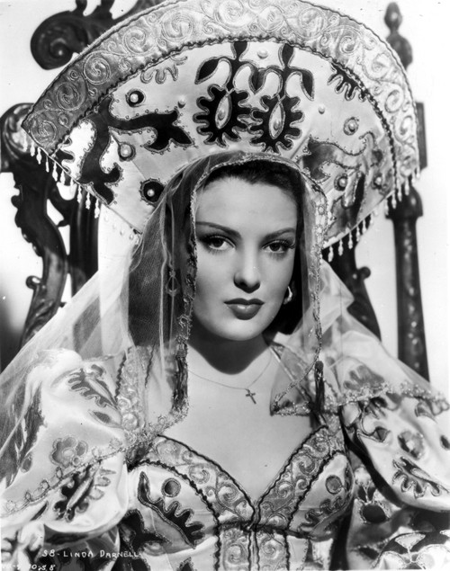 Linda Darnell posed wearing Queen Outfit in Black and White Photo Print - Item # VARCEL696792