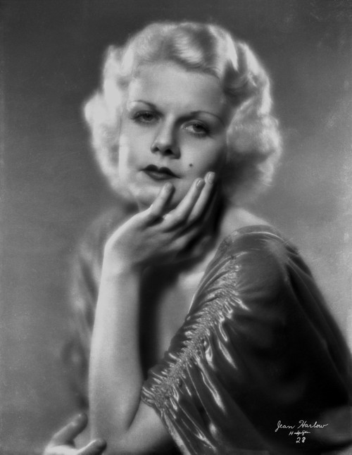 Jean Harlow Portrait in Shiny Black V-Neck Pleated and Frilled Short Sleeve Silk Dress with Left Hand on the Lower Chin Photo Print - Item # VARCEL696778