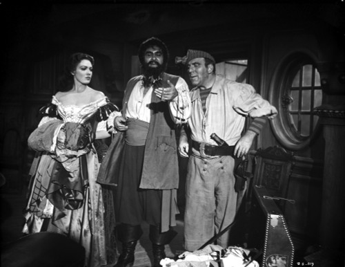 Linda Darnell posed with Two Man in Pirate Outfits in Black and White Photo Print - Item # VARCEL696840