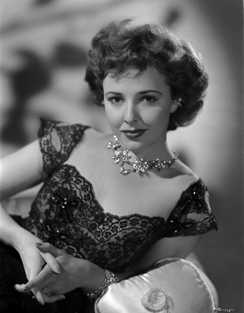 Laraine Day posed wearing Necklace and Black Dress in Black and White Photo Print - Item # VARCEL696860