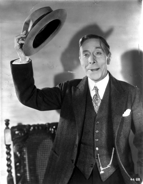 A Signed Portrait Of George Arliss Lifting A Hat Photo Print - Item # VARCEL696942