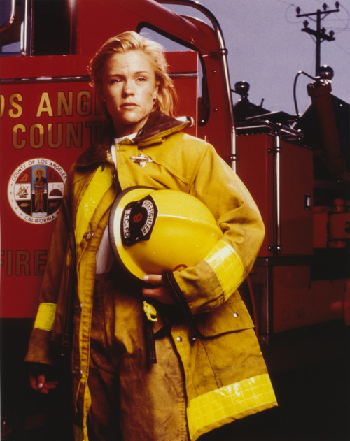 Christine Elise standing in Firefighter Outfit Photo Print - Item # VARCEL696967