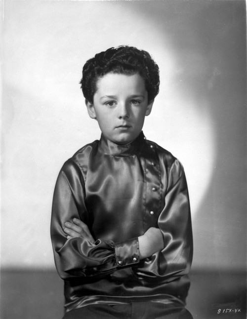Freddie Bartholomew sitting on Diving Board With Woman Photo Print - Item # VARCEL697047