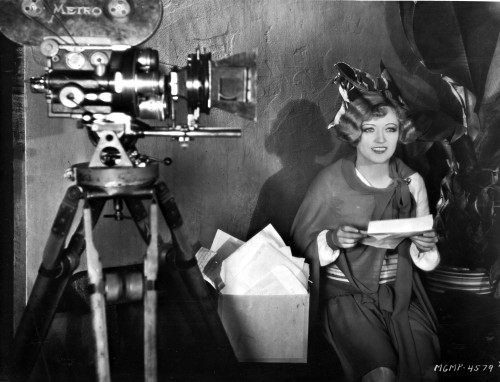 Marion Davies posed Beside A Camera in Black and White Photo Print - Item # VARCEL697056