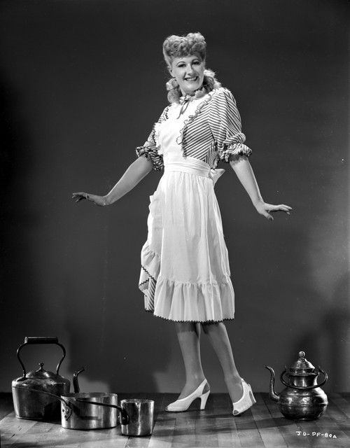 Joan Davis posed in Maid Outfit in Black and White Photo Print - Item # VARCEL697139
