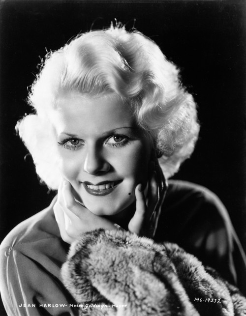 Jean Harlow Portrait in Black Long Sleeve Velvet Collar Shirt and Fur Pelt Coat with Both Hands on the Lower Jaw and smiling Photo Print - Item # VARCEL697124