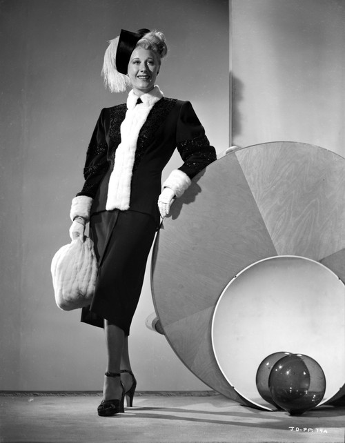 Joan Davis Leaning on the Wall with Her Elbow Photo Print - Item # VARCEL697154