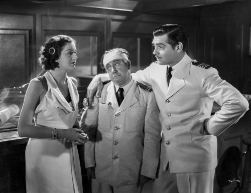 Jean Harlow Scene from a Film standing with Two Men in White V-Neck Sleeveless Silk Dress with Hands Together Photo Print - Item # VARCEL697155