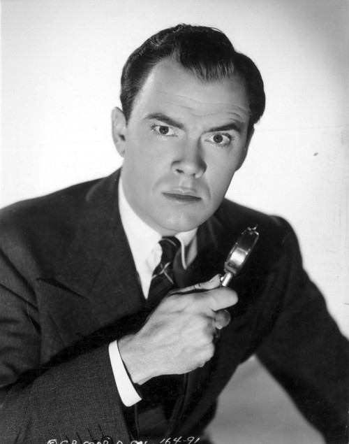 John Beal Posed in Black Holding Fork Photo Print - Item # VARCEL697157