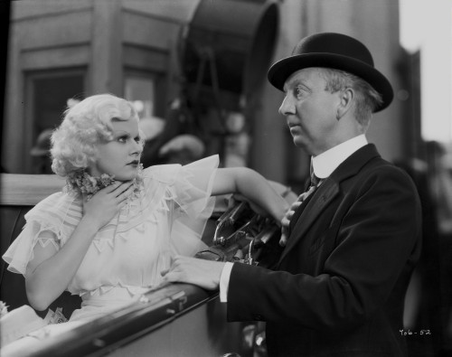 Jean Harlow Scene from a Film sitting on a Car in White Short Sleeve Silk Blouse Photo Print - Item # VARCEL697173
