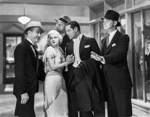 Jean Harlow Scene from a Film standing with Four Men in Black Suit Photo Print - Item # VARCEL697176