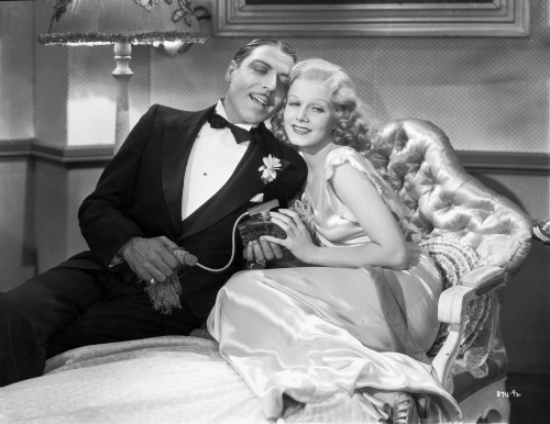 Jean Harlow Scene from a Film Seated on the Couch Photo Print - Item # VARCEL697205