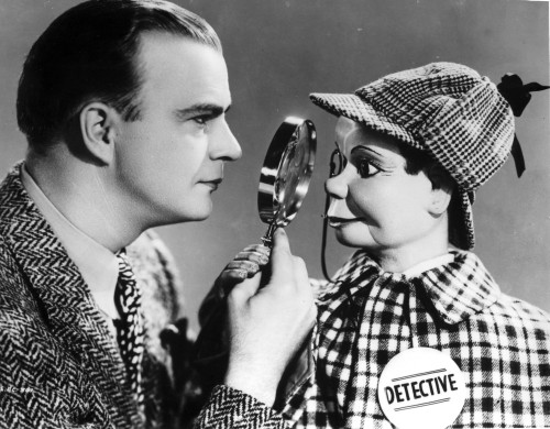 Edgar Bergen Checking Puppet's Face With Magnifying Glass Photo Print - Item # VARCEL697209