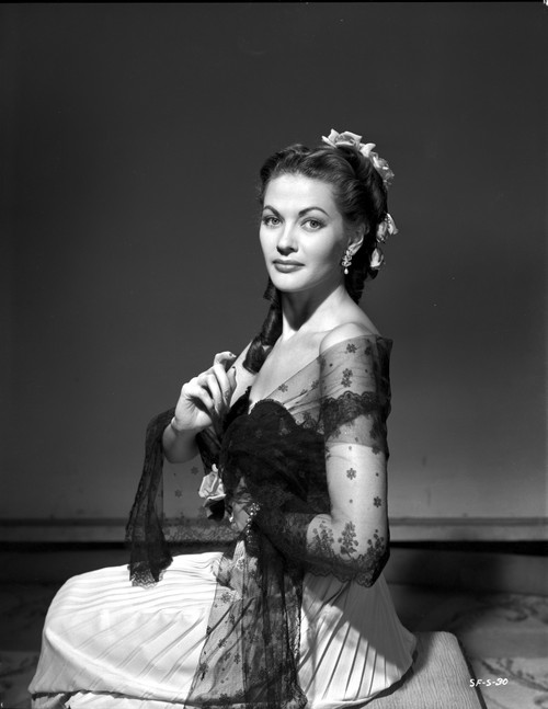 Yvonne Decarlo Kneeling Pose in Black Net Dress with a Smile Photo Print - Item # VARCEL697247