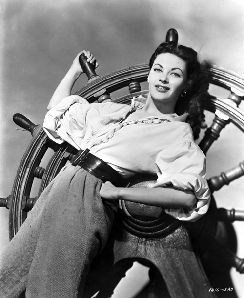 Yvonne Decarlo posed in Pirate Outfit in Black and White Photo Print - Item # VARCEL697256