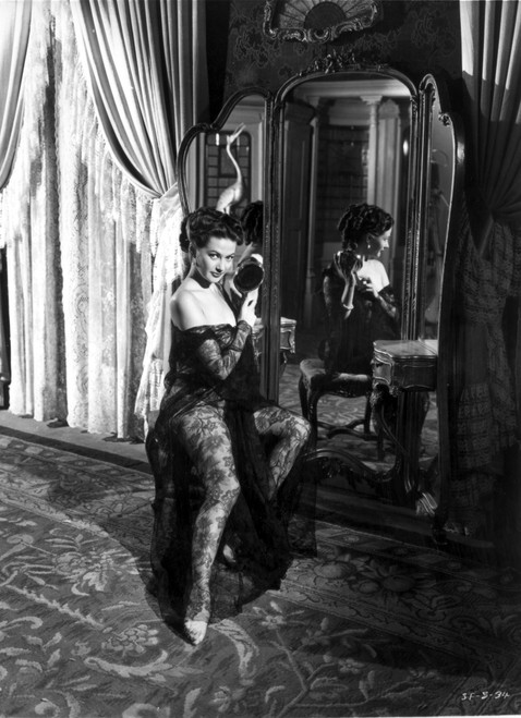 Yvonne Decarlo smiling in Black Dress in Black and White Photo Print - Item # VARCEL697268