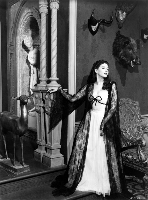 Yvonne Decarlo standing in White Dress with Floral Long Robe Photo Print - Item # VARCEL697295