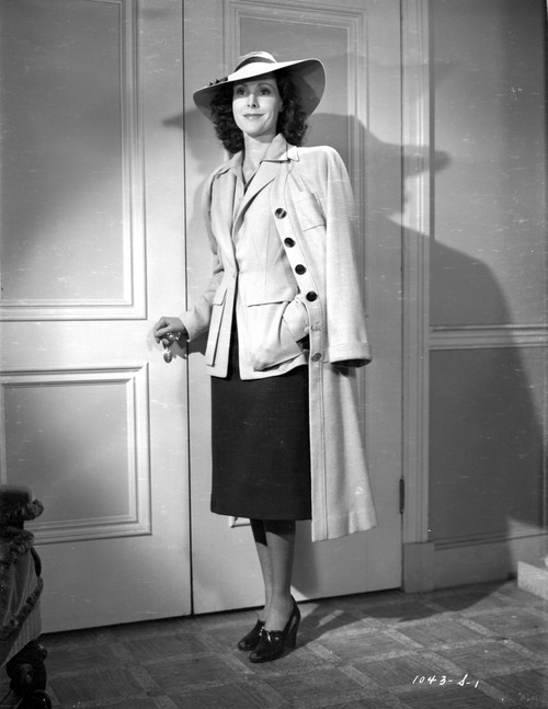 Frances Dee posed in Formal Outfit and Coat in Black and White Photo Print - Item # VARCEL697378