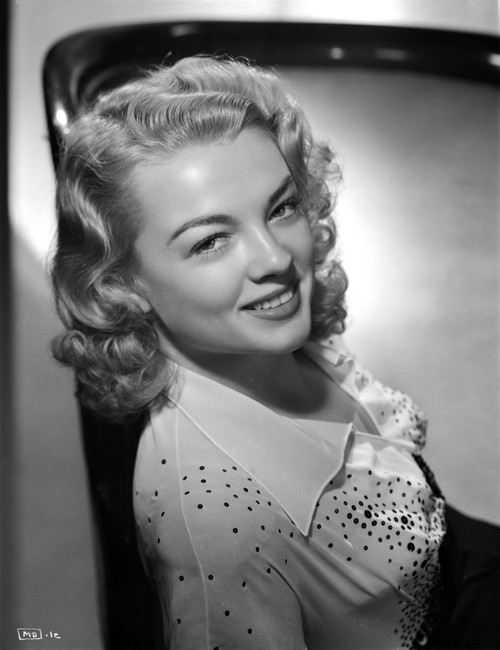 Myrna Dell Reclining in Dotted Dress Photo Print - Item # VARCEL697394