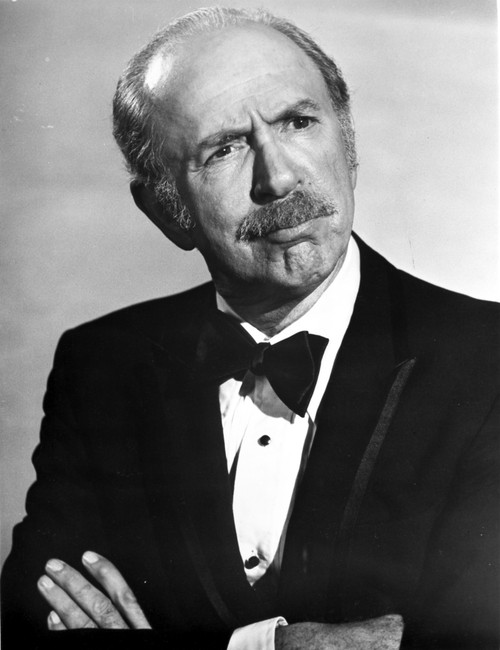 Jack Albertson Posed in Black Suit With Arm's Cross Photo Print - Item # VARCEL697387