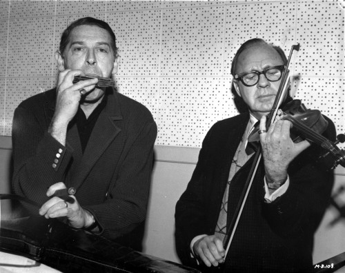 Milton Berle and a violinist Photo Print - Item # VARCEL697418