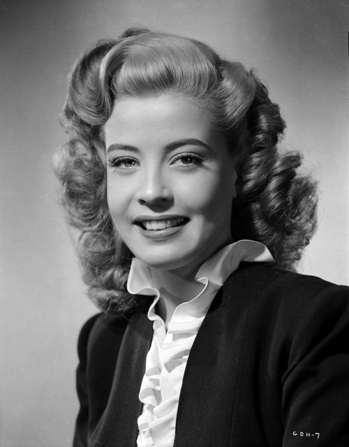 Gloria DeHaven Curly Hair smiling wearing Black Coat Photo Print - Item # VARCEL697461
