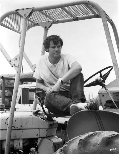 Joe Don Baker in a tractor Photo Print - Item # VARCEL697558