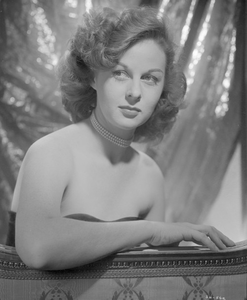 Susan Hayward sitting on a Black Tube Dress Photo Print - Item # VARCEL697542