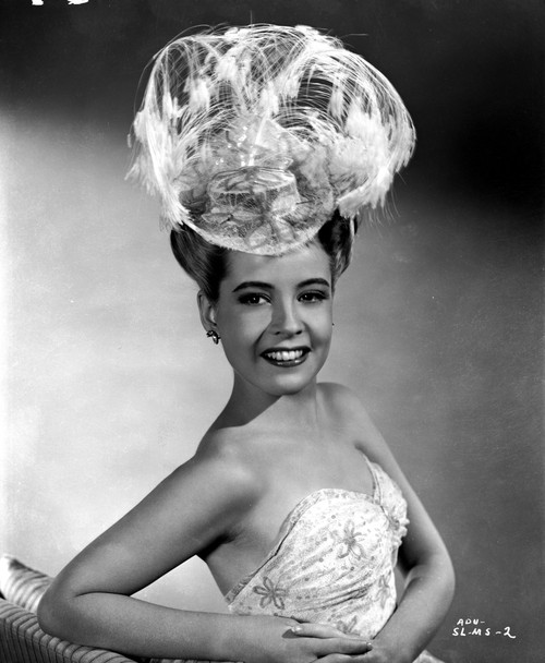 Gloria DeHaven smiling in A Portrait wearing A Feather Hat Photo Print - Item # VARCEL697547