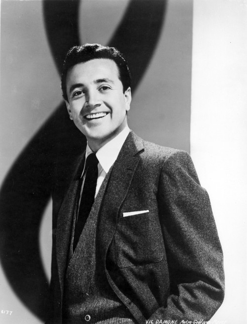 Vic Damone smiling in Black Suit Photo Print - Item # VARCEL697601