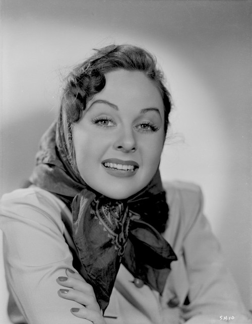 Susan Hayward wearing a Long Sleeve Blouse with Scarf on Head Photo Print - Item # VARCEL697647
