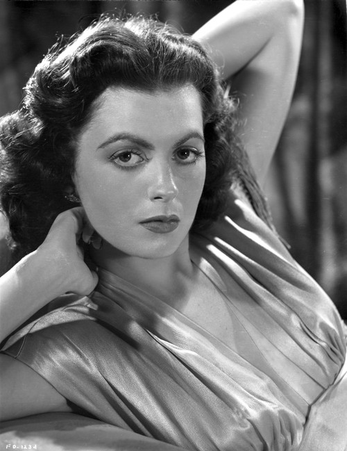 Faith Domergue Posed with Hands Behind Head Photo Print - Item # VARCEL697648