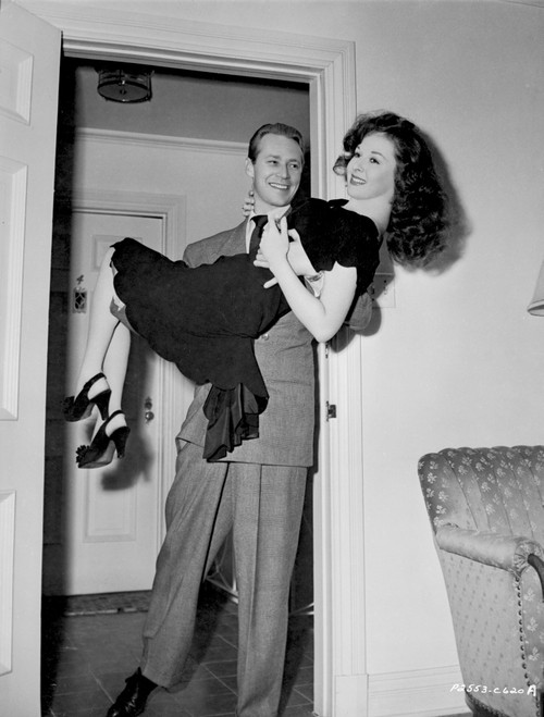 Susan Hayward Carried by a Man in Suit and Tie Photo Print - Item # VARCEL697671