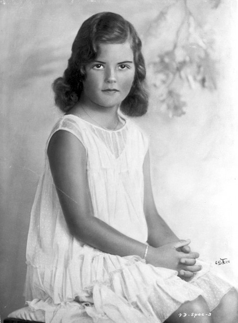 Faith Domergue Seated in White Dress Photo Print - Item # VARCEL697672