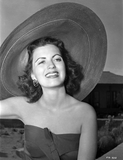 Faith Domergue in Floppy Beach Hat Photo Print - Item # VARCEL697681