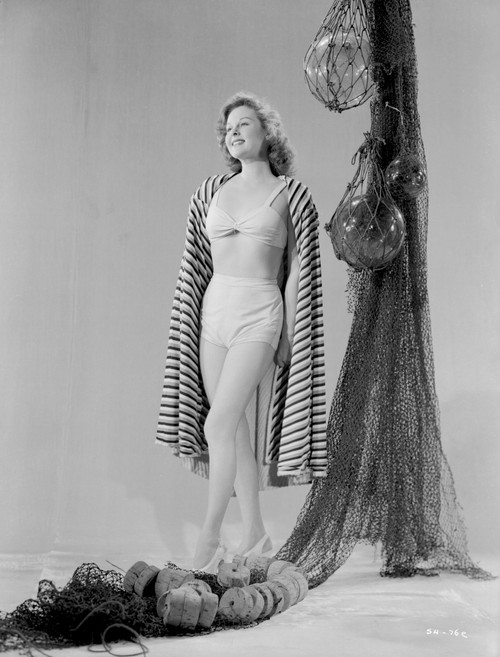 Susan Hayward wearing a Swimsuit with a Stripe Cloth Photo Print - Item # VARCEL697774