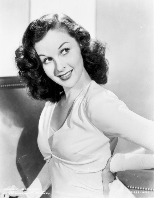 Susan Hayward wearing a White Dress and Hands on Waist Photo Print - Item # VARCEL697818
