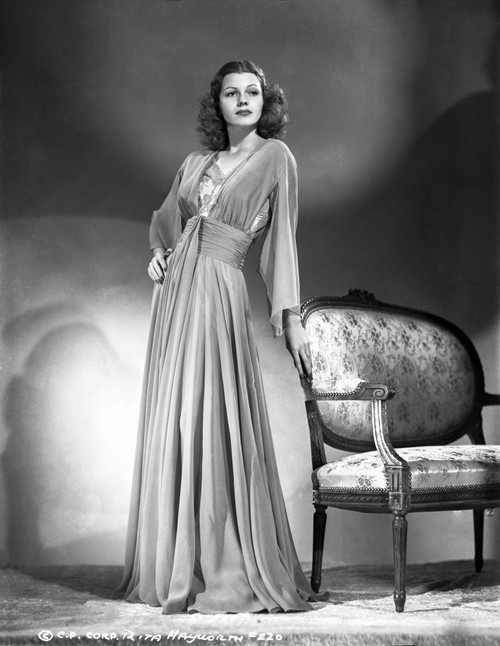 Rita Hayworth Leaning in a Beautiful Gown Photo Print - Item # VARCEL697903