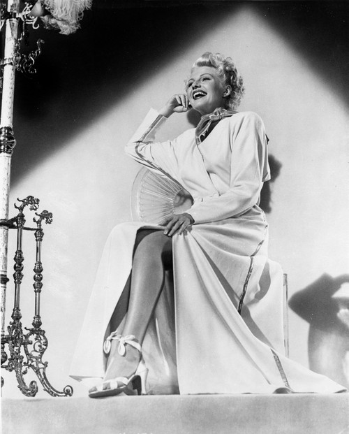 Rita Hayworth Leaning in a Crossed Legs Pose Photo Print - Item # VARCEL697943