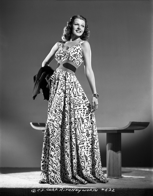 Rita Hayworth Posed in a Colorful Gown Photo Print - Item # VARCEL698025