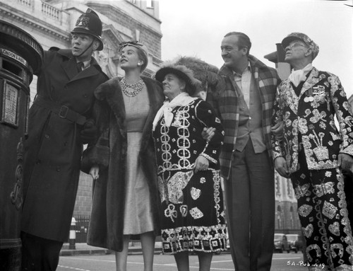 Silken Affair Group of People Talking in Black and White Photo Print - Item # VARCEL698050