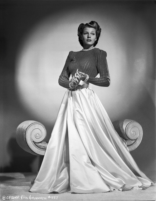 Rita Hayworth Posed in Dress with Long Skirt Photo Print - Item # VARCEL698092