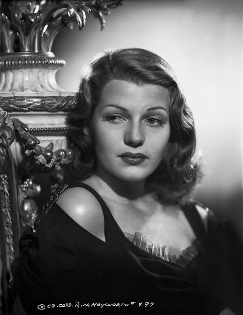 Rita Hayworth Posed with a Black Gown Photo Print - Item # VARCEL698156