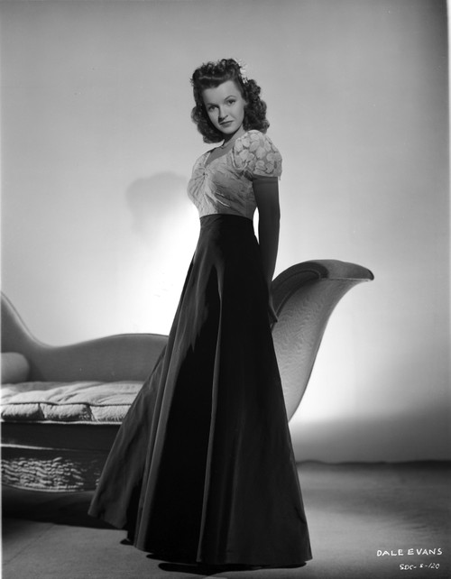 Dale Evans on a Lace Puff Sleeve Dress standing Portrait Photo Print - Item # VARCEL698183