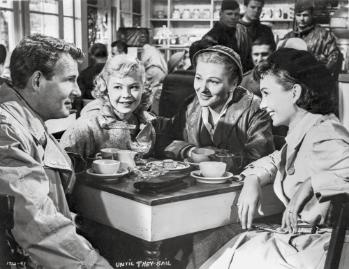 Until They Sail Man and Three Woman Having Conversation Photo Print - Item # VARCEL698188