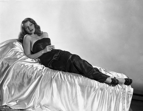 Rita Hayworth Lounging in Black Gown Photo Print - Item # VARCEL698230
