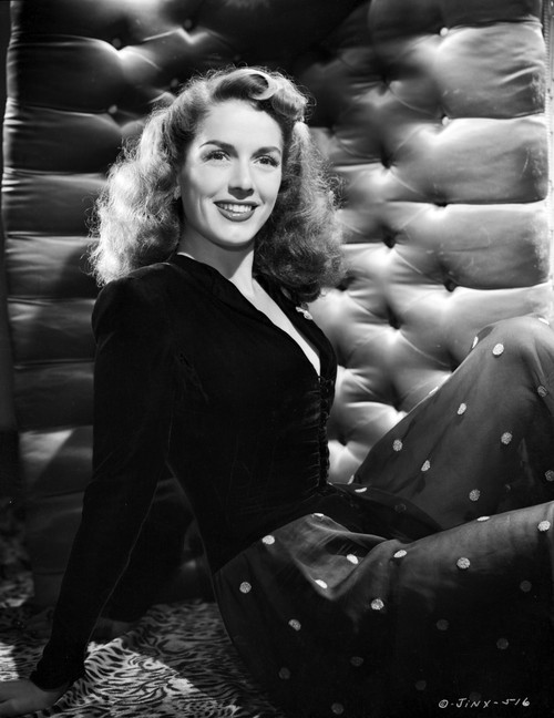 Jinx Falkenburg on a Dark Top and Leaning Portrait Photo Print - Item # VARCEL698260