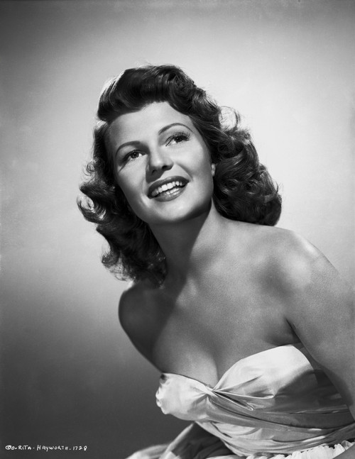 Rita Hayworth Looking Up and smiling Posed Photo Print - Item # VARCEL698274