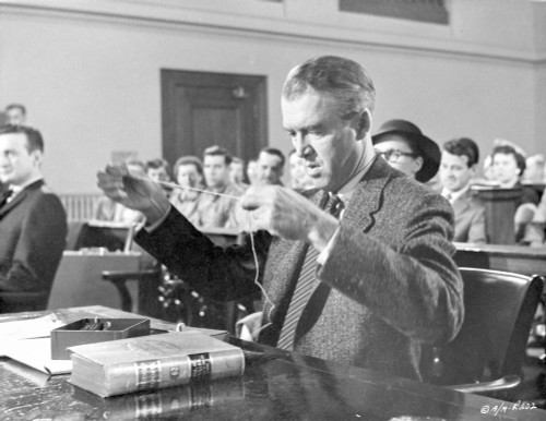 Anatomy Of A Murder Man Showing an Evidence in Movie Scene in Black and White Photo Print - Item # VARCEL698304