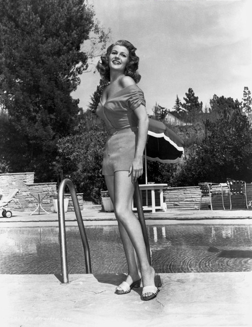 Rita Hayworth Posed Near the Swimming Pool Photo Print - Item # VARCEL698317